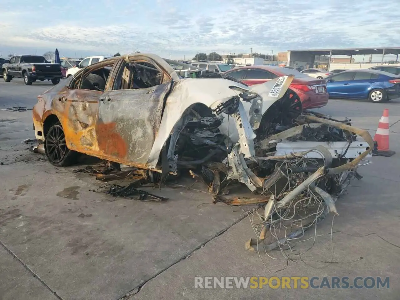 4 Photograph of a damaged car 4T1T11AKXPU121410 TOYOTA CAMRY 2023