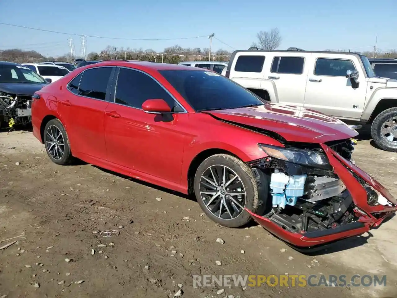 4 Photograph of a damaged car 4T1T11AKXPU182594 TOYOTA CAMRY 2023