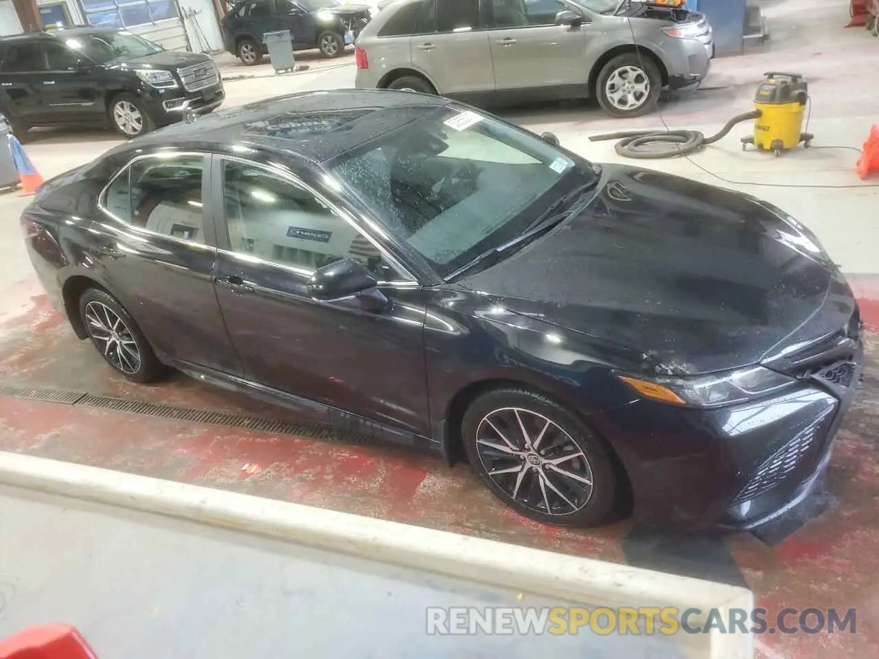 4 Photograph of a damaged car 4T1T11AKXPU747670 TOYOTA CAMRY 2023