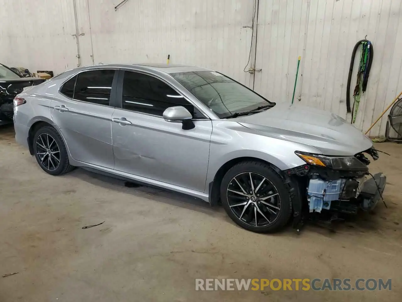 4 Photograph of a damaged car 4T1T11AKXPU773587 TOYOTA CAMRY 2023