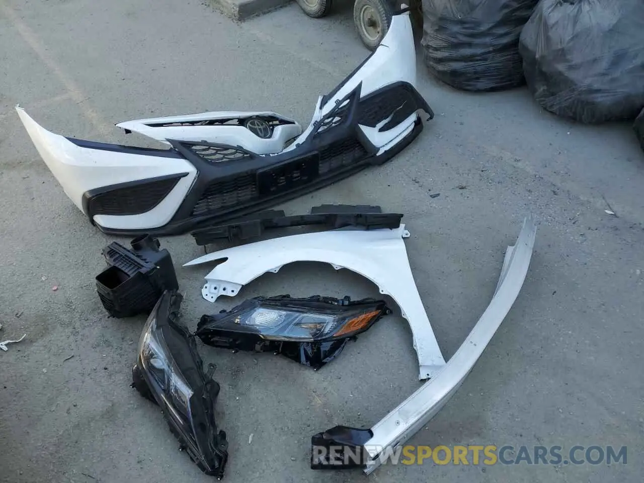 12 Photograph of a damaged car 4T1T11AKXPU782306 TOYOTA CAMRY 2023