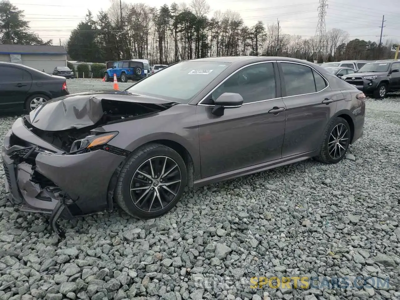 1 Photograph of a damaged car 4T1T11AKXPU808838 TOYOTA CAMRY 2023