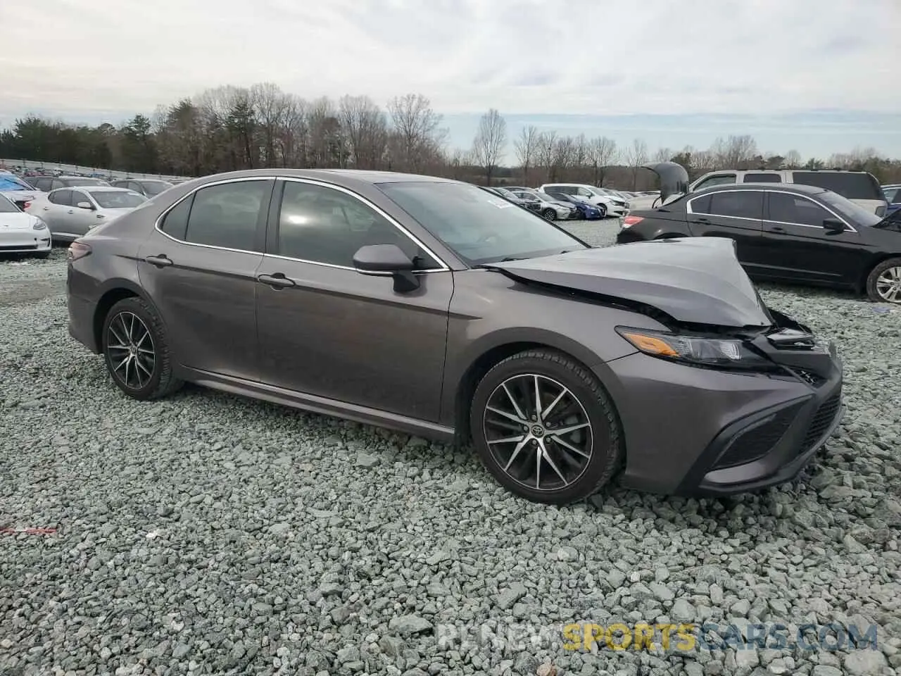 4 Photograph of a damaged car 4T1T11AKXPU808838 TOYOTA CAMRY 2023
