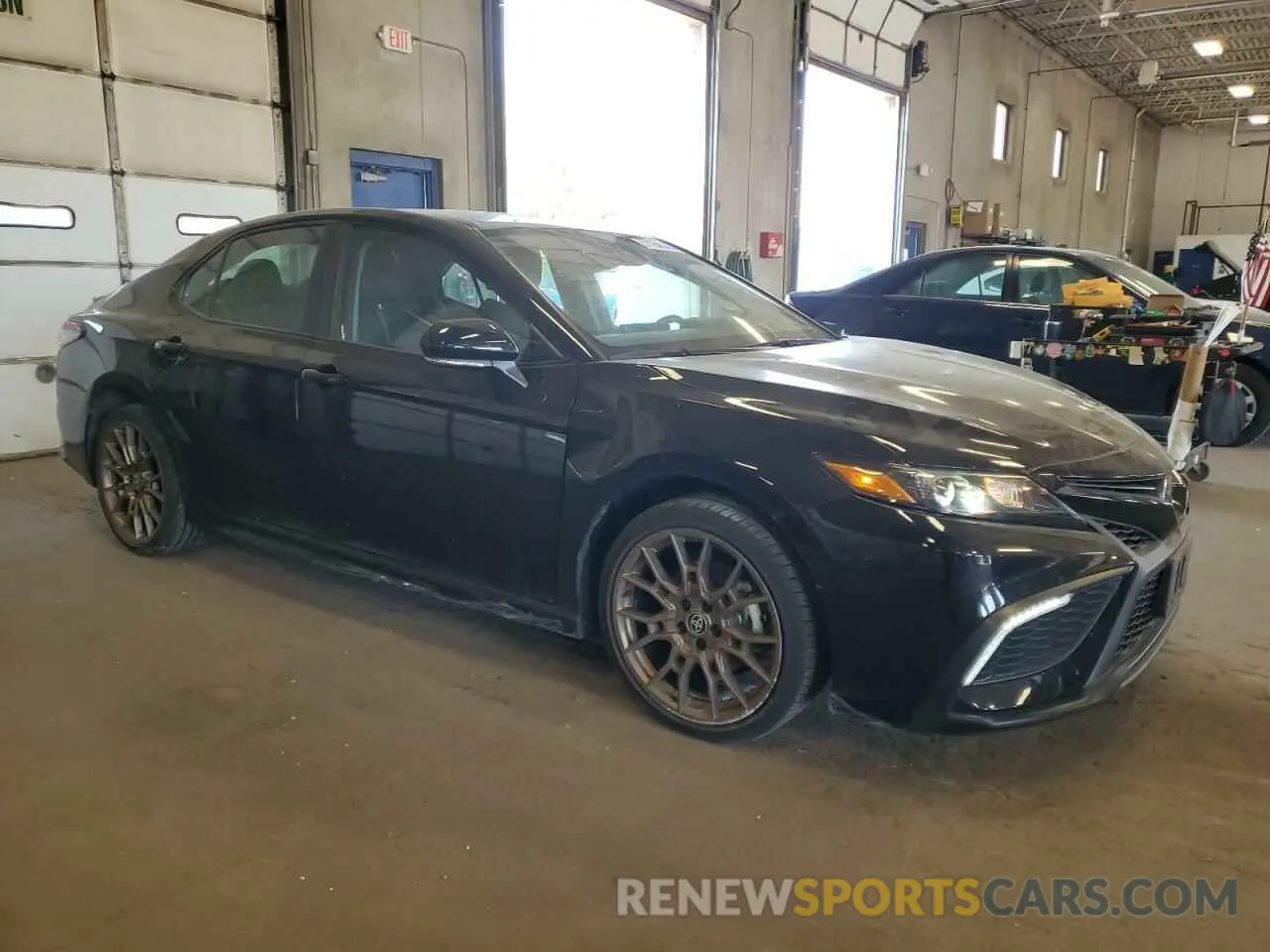 4 Photograph of a damaged car 4T1T11BK0PU104839 TOYOTA CAMRY 2023