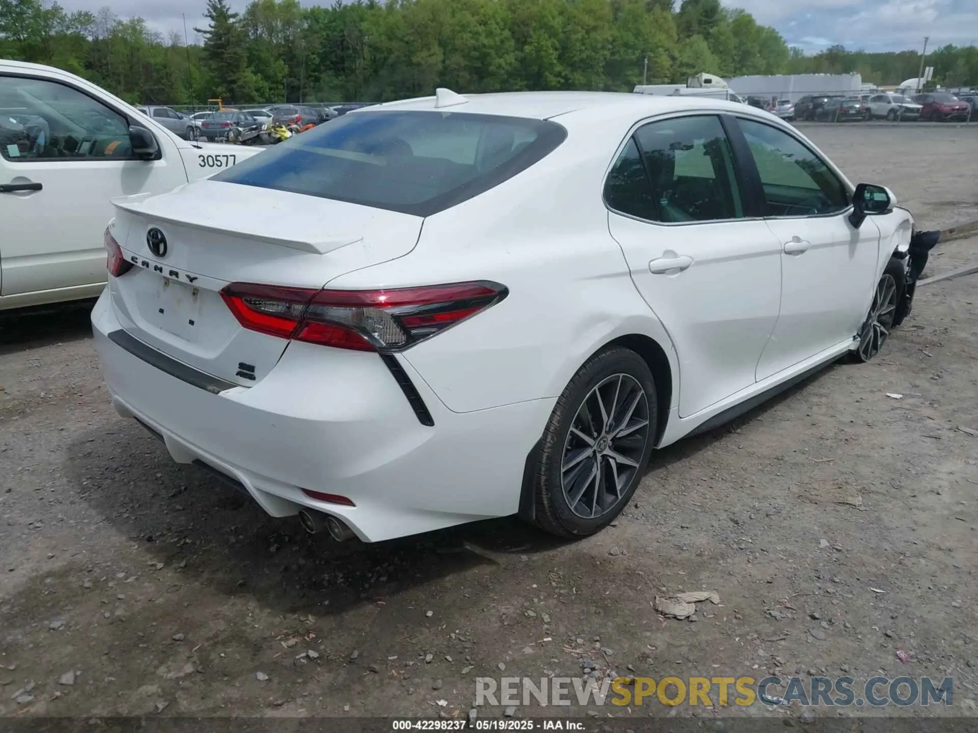 4 Photograph of a damaged car 4T1T11BK3PU105645 TOYOTA CAMRY 2023