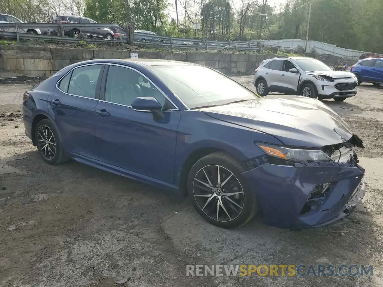 4 Photograph of a damaged car 4T1T11BK7PU075114 TOYOTA CAMRY 2023