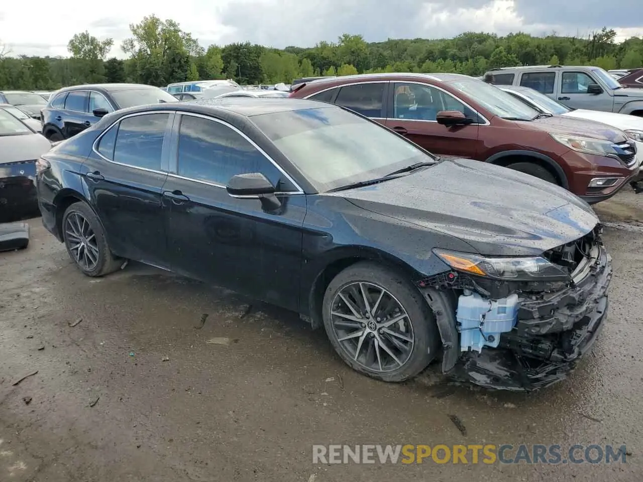 4 Photograph of a damaged car 4T1T11BK9PU078385 TOYOTA CAMRY 2023