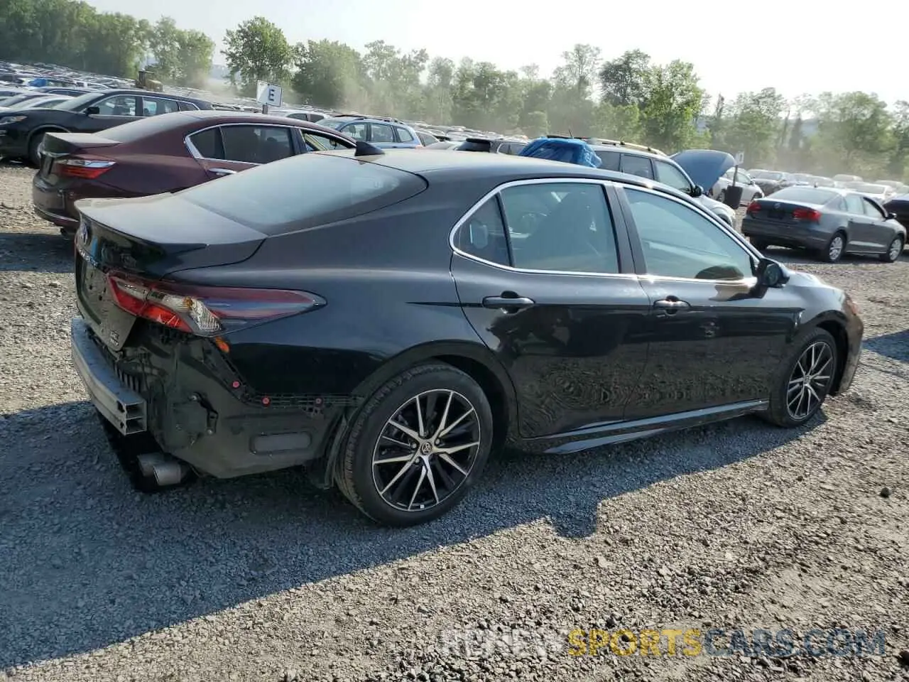 3 Photograph of a damaged car 4T1T11BK9PU097986 TOYOTA CAMRY 2023
