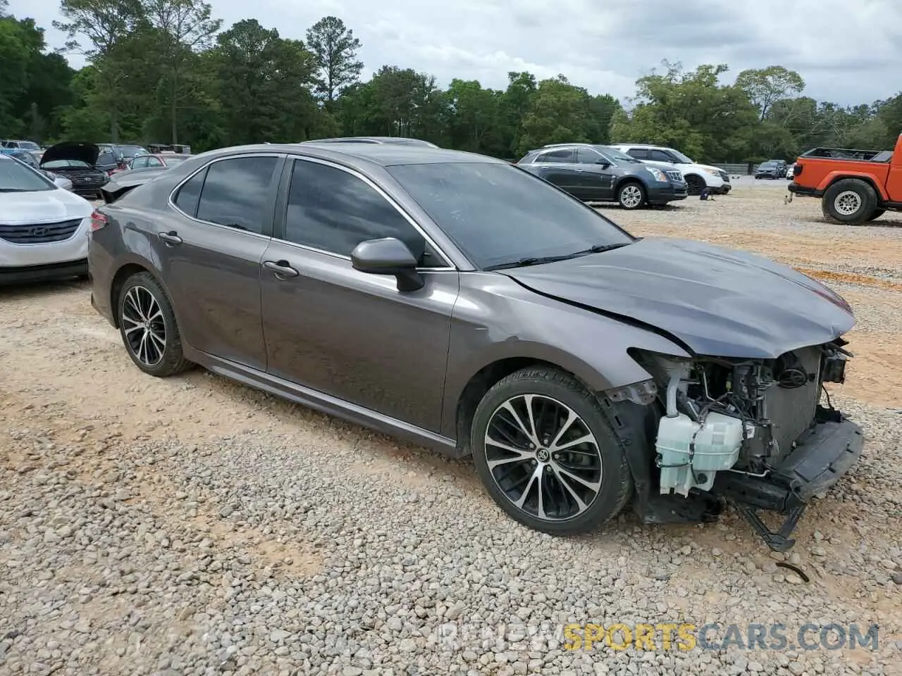 4 Photograph of a damaged car 4T1B11HKXKU235384 TOYOTA CAMRY 2024