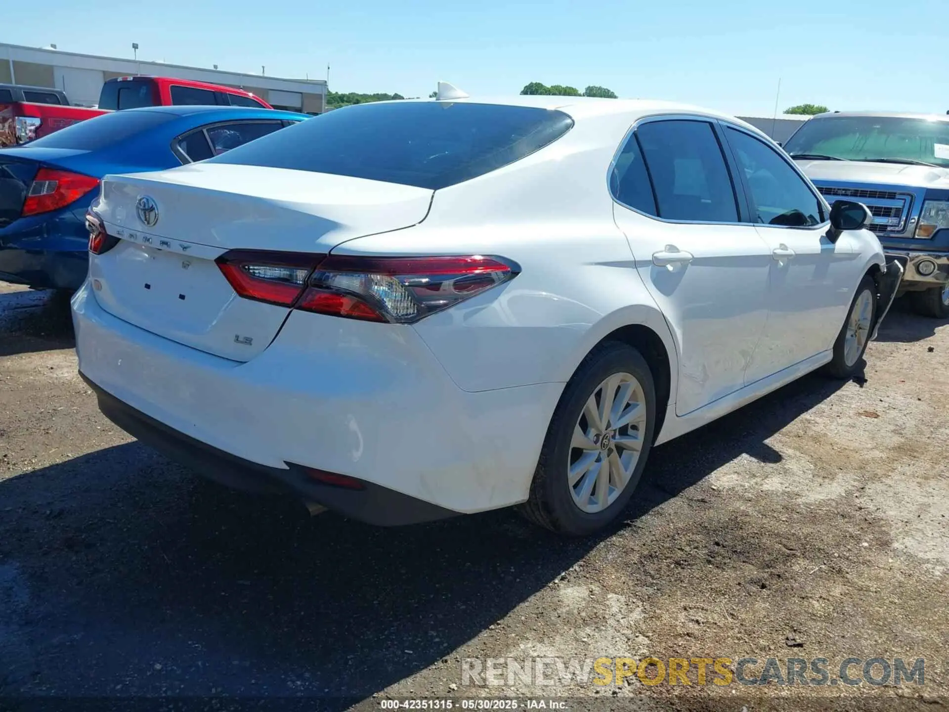 4 Photograph of a damaged car 4T1C11AK0RU881882 TOYOTA CAMRY 2024