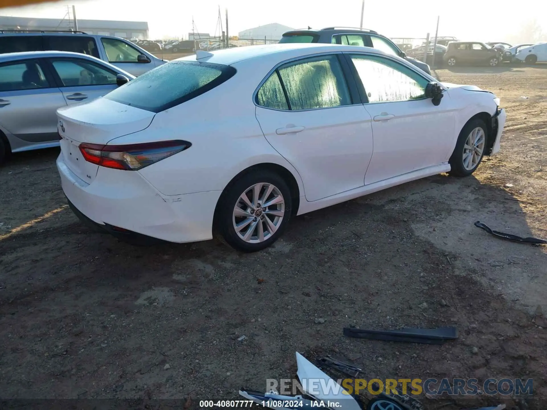 4 Photograph of a damaged car 4T1C11AK0RU883356 TOYOTA CAMRY 2024