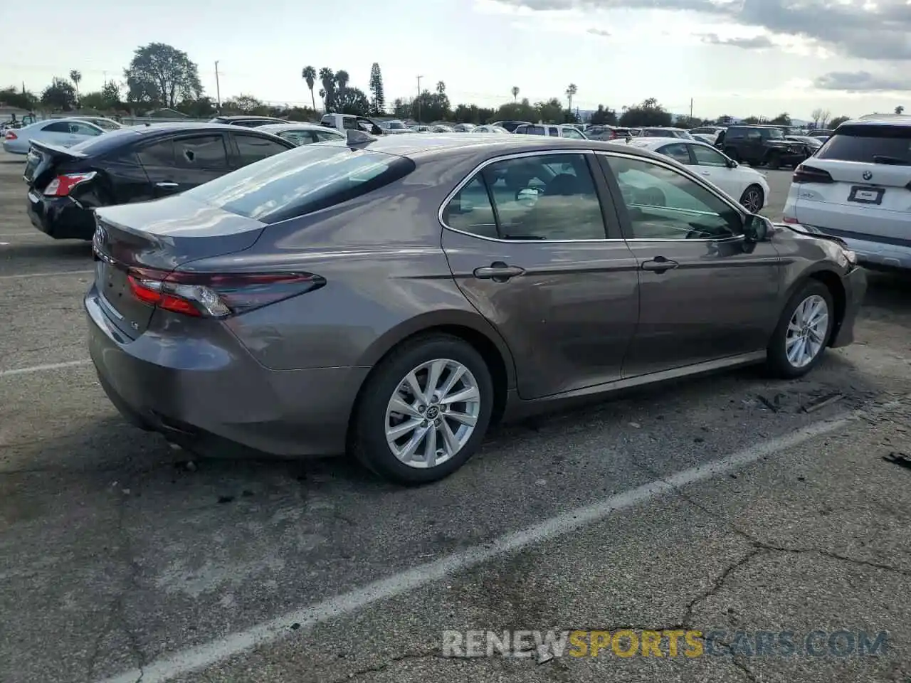 3 Photograph of a damaged car 4T1C11AK1RU900858 TOYOTA CAMRY 2024