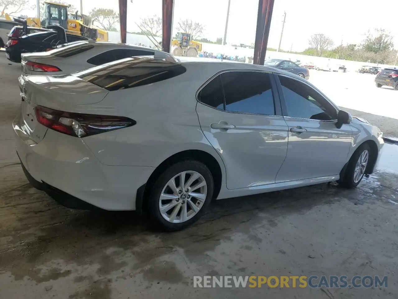 3 Photograph of a damaged car 4T1C11AK2RU206275 TOYOTA CAMRY 2024
