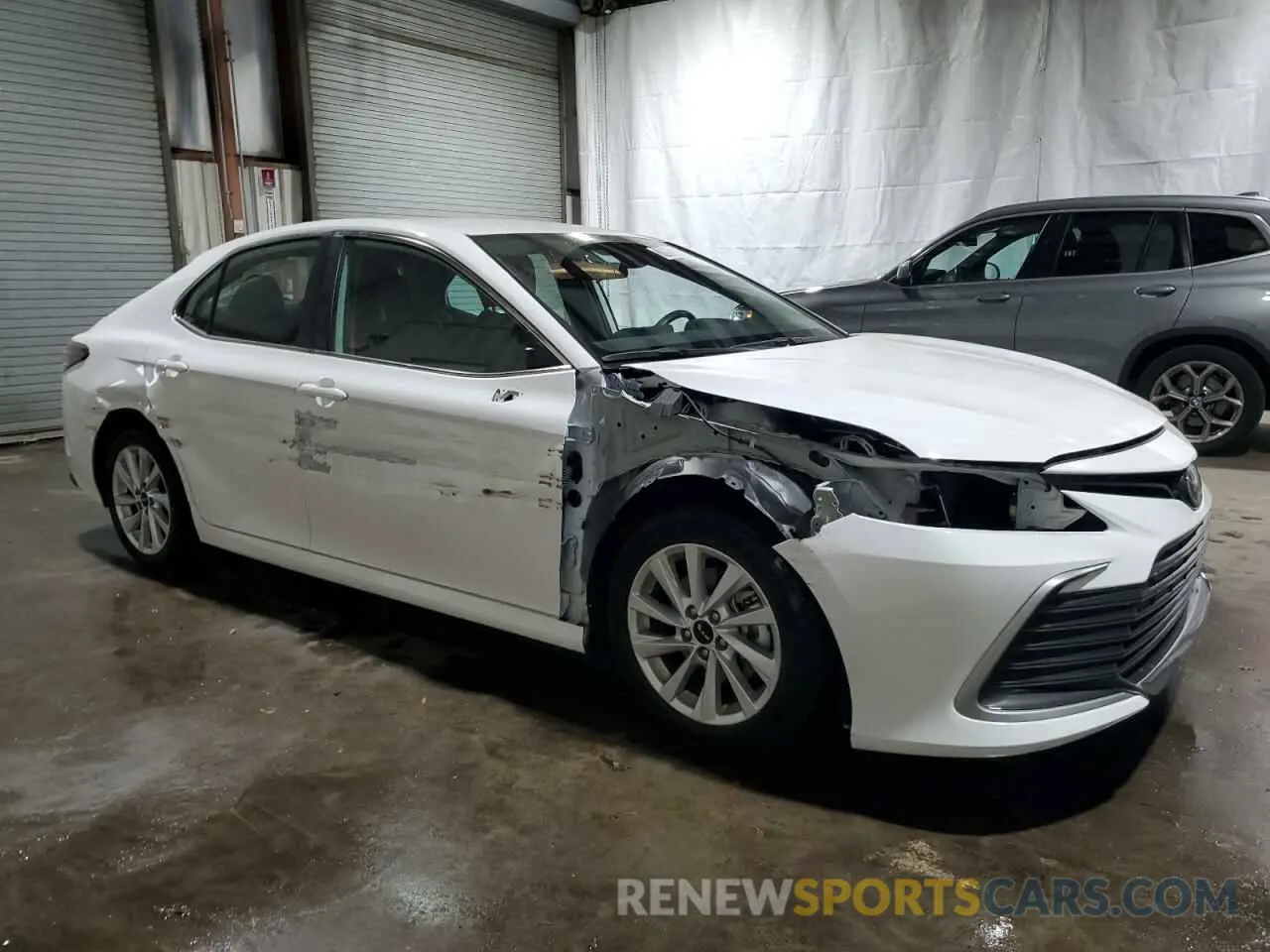 4 Photograph of a damaged car 4T1C11AK5RU862213 TOYOTA CAMRY 2024