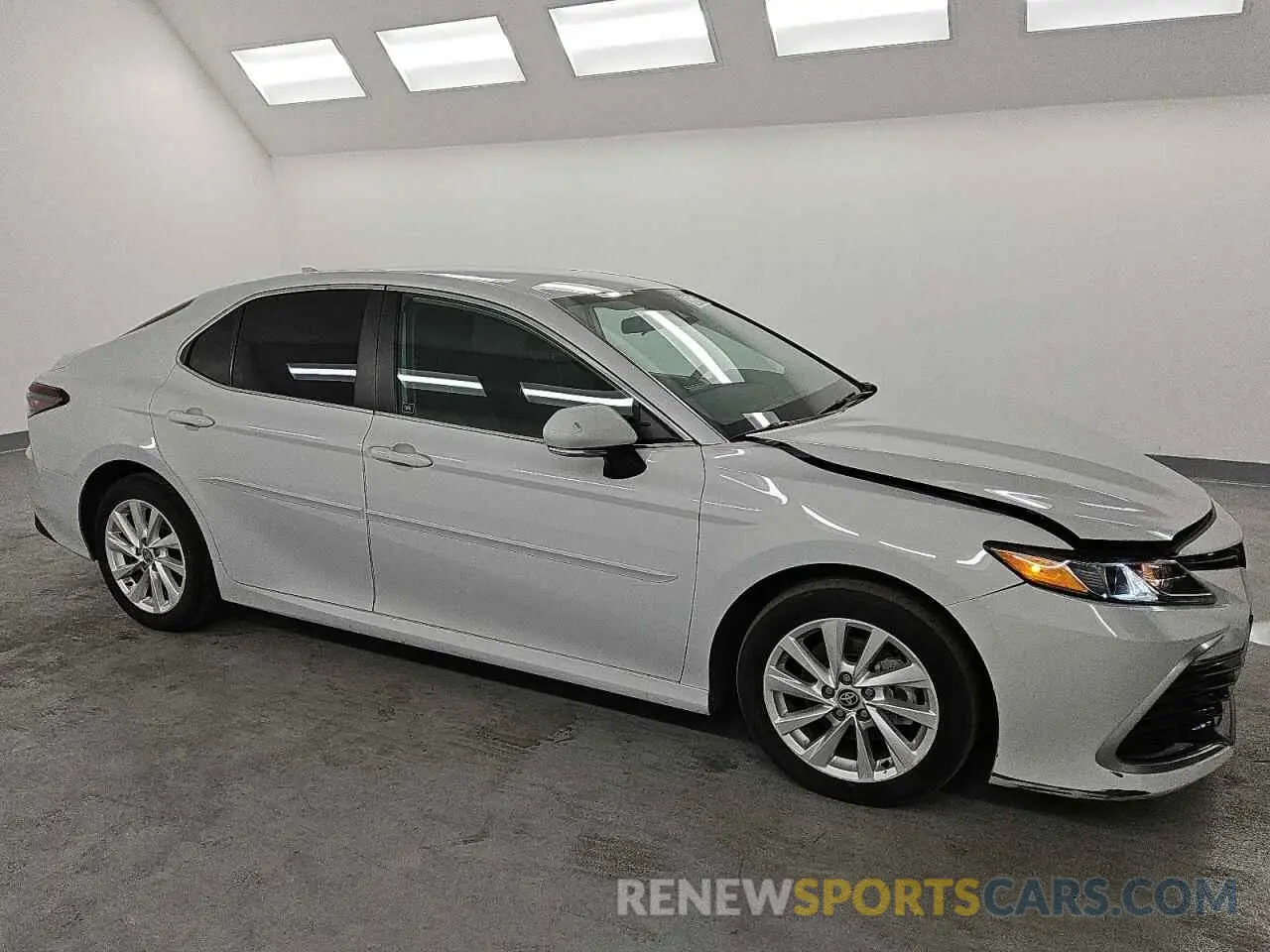 4 Photograph of a damaged car 4T1C11AK6RU231812 TOYOTA CAMRY 2024