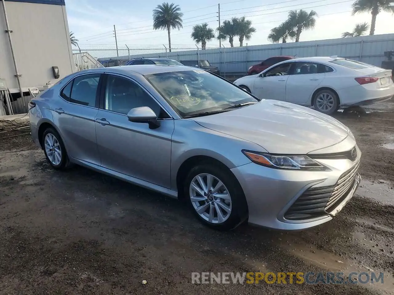 4 Photograph of a damaged car 4T1C11AK6RU859613 TOYOTA CAMRY 2024