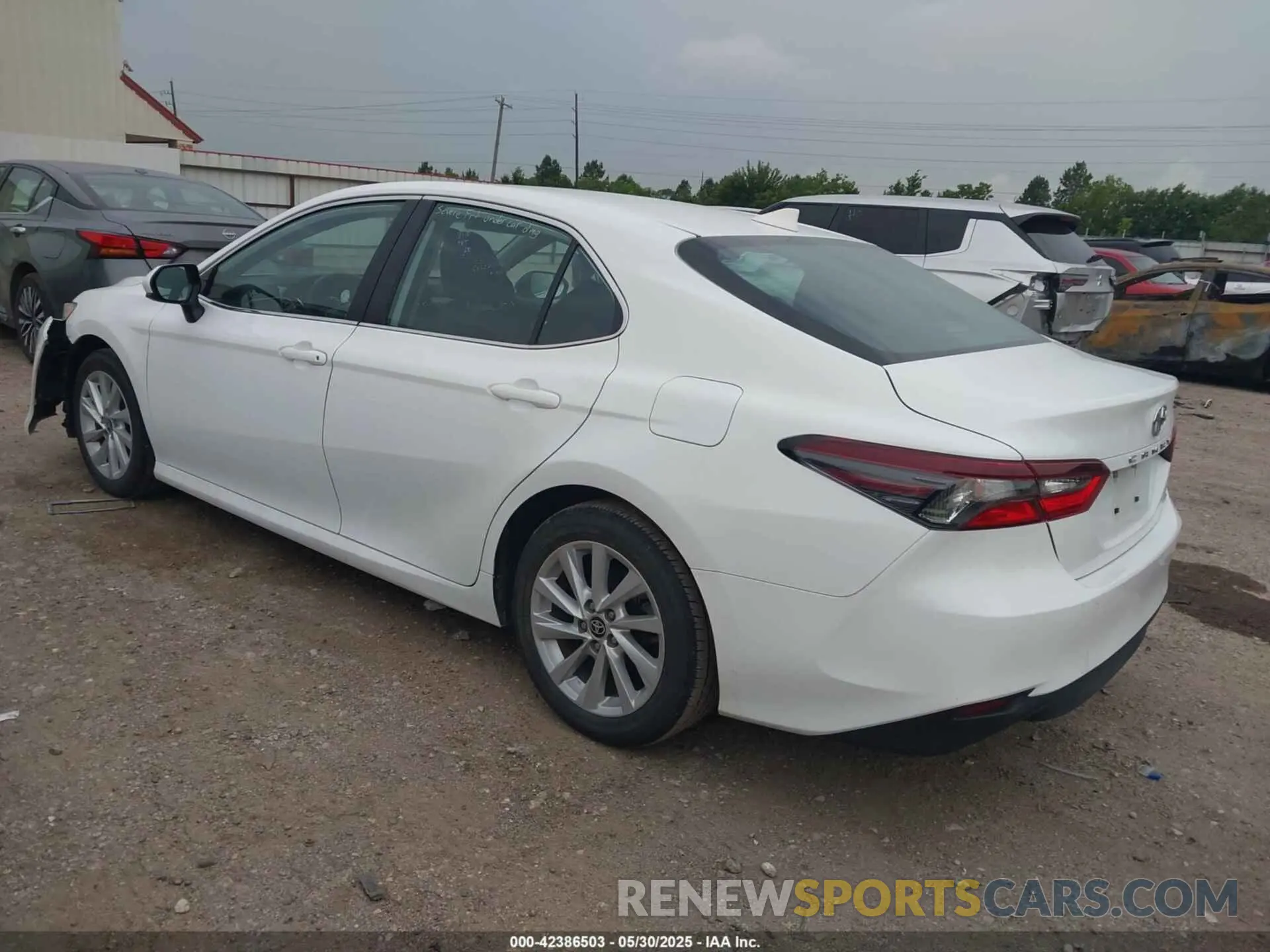 3 Photograph of a damaged car 4T1C11AK6RU884401 TOYOTA CAMRY 2024