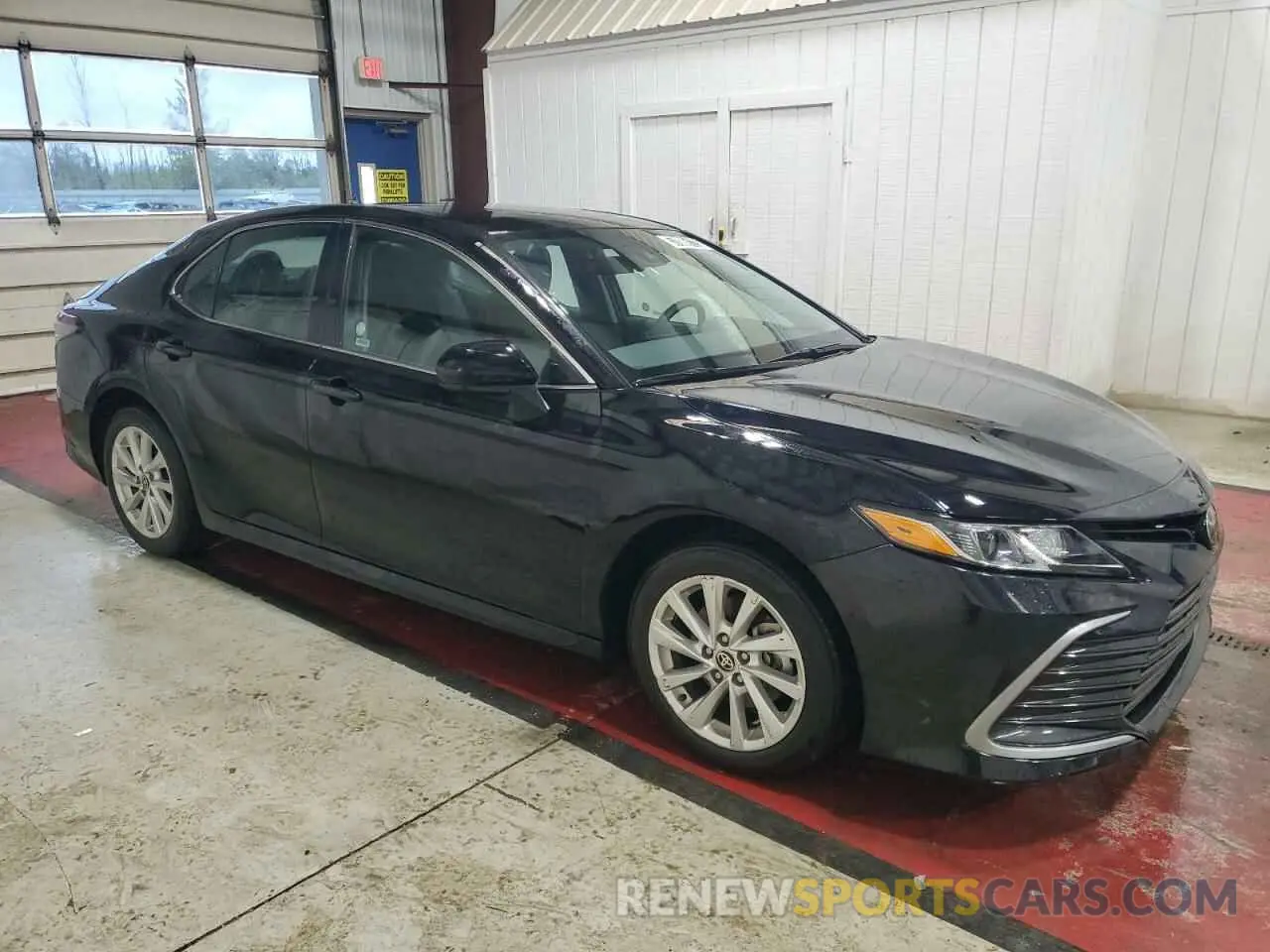 4 Photograph of a damaged car 4T1C11AK7RU221810 TOYOTA CAMRY 2024