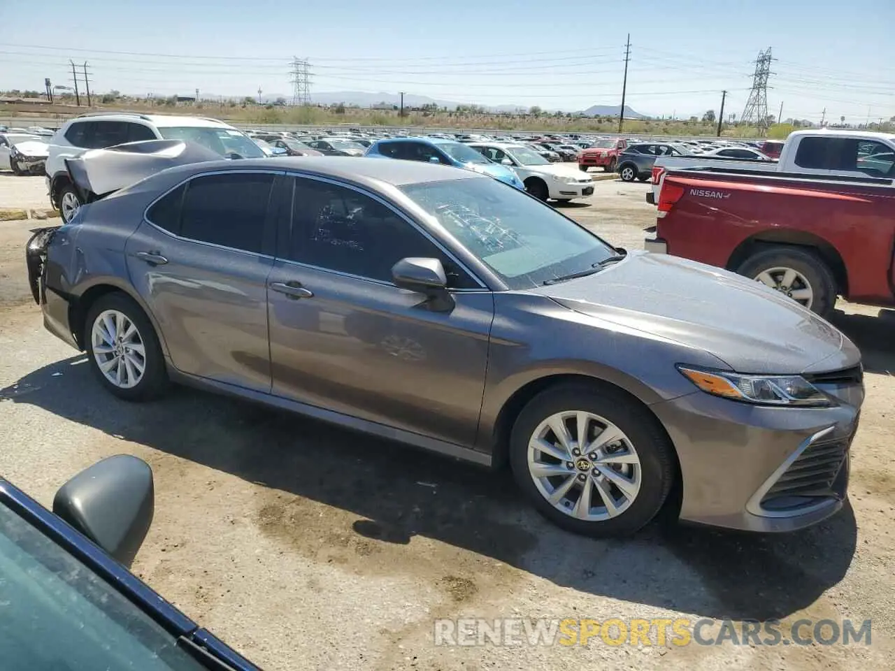 4 Photograph of a damaged car 4T1C11AK7RU232712 TOYOTA CAMRY 2024