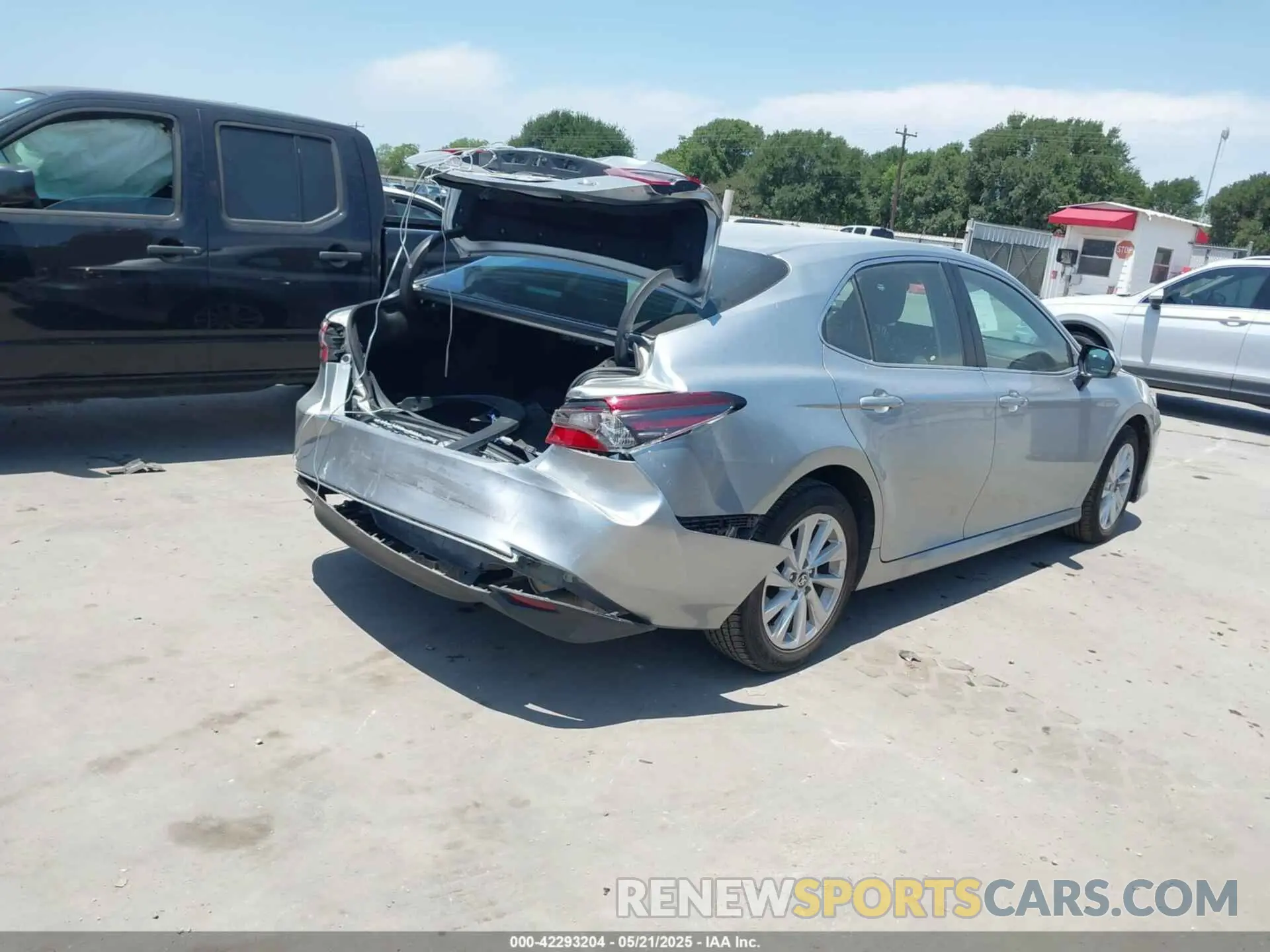 4 Photograph of a damaged car 4T1C11AK8RU867759 TOYOTA CAMRY 2024