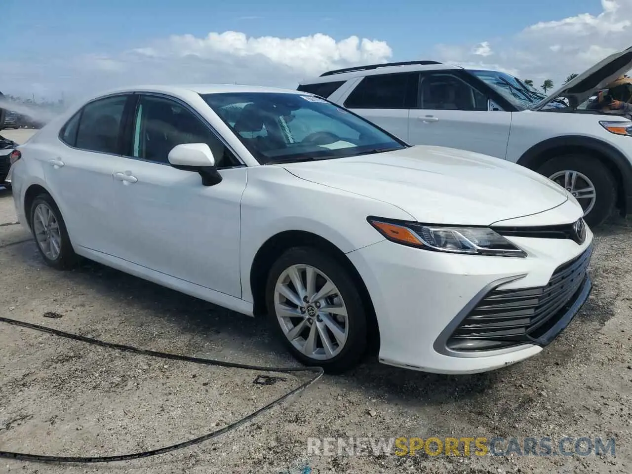 4 Photograph of a damaged car 4T1C11AKXRU202491 TOYOTA CAMRY 2024
