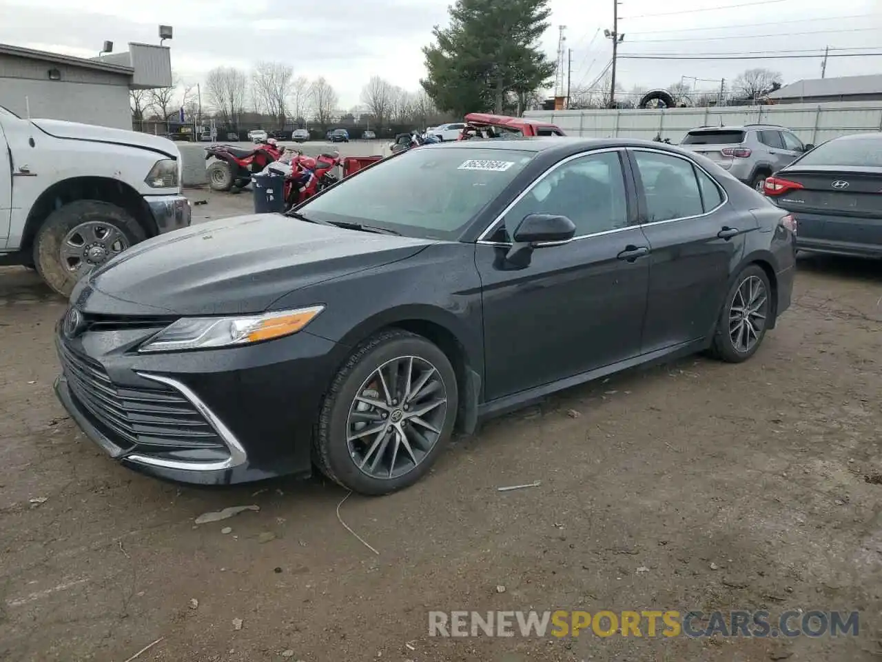 1 Photograph of a damaged car 4T1F11AKXRU879862 TOYOTA CAMRY 2024