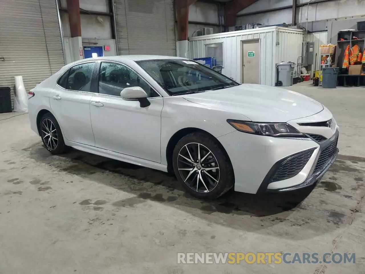 4 Photograph of a damaged car 4T1G11AK0RU232911 TOYOTA CAMRY 2024