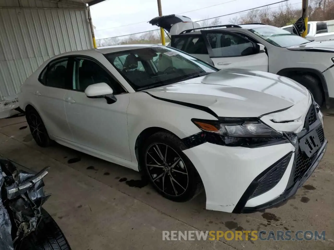 4 Photograph of a damaged car 4T1G11AK2RU911353 TOYOTA CAMRY 2024