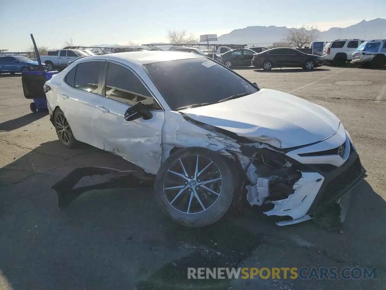 4 Photograph of a damaged car 4T1G11AK3RU873292 TOYOTA CAMRY 2024