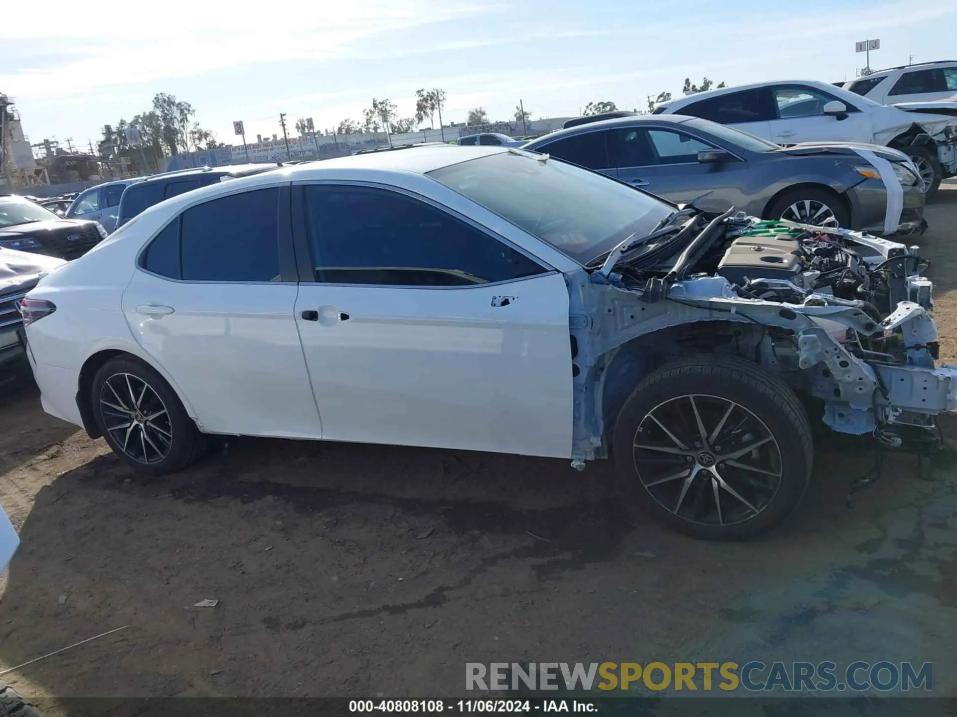 14 Photograph of a damaged car 4T1G11AK3RU884437 TOYOTA CAMRY 2024