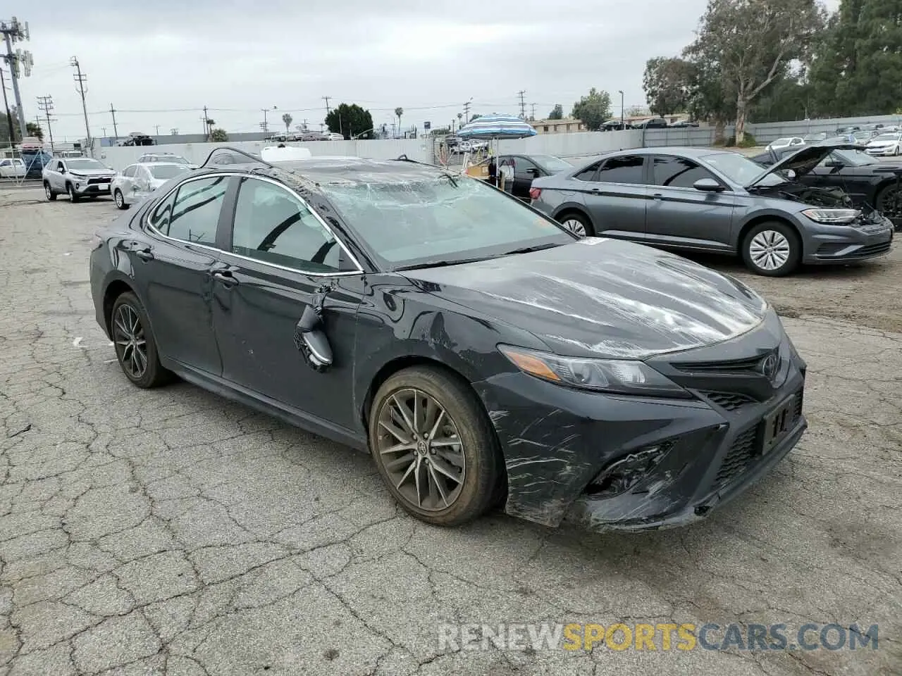 4 Photograph of a damaged car 4T1G11AK5RU257352 TOYOTA CAMRY 2024