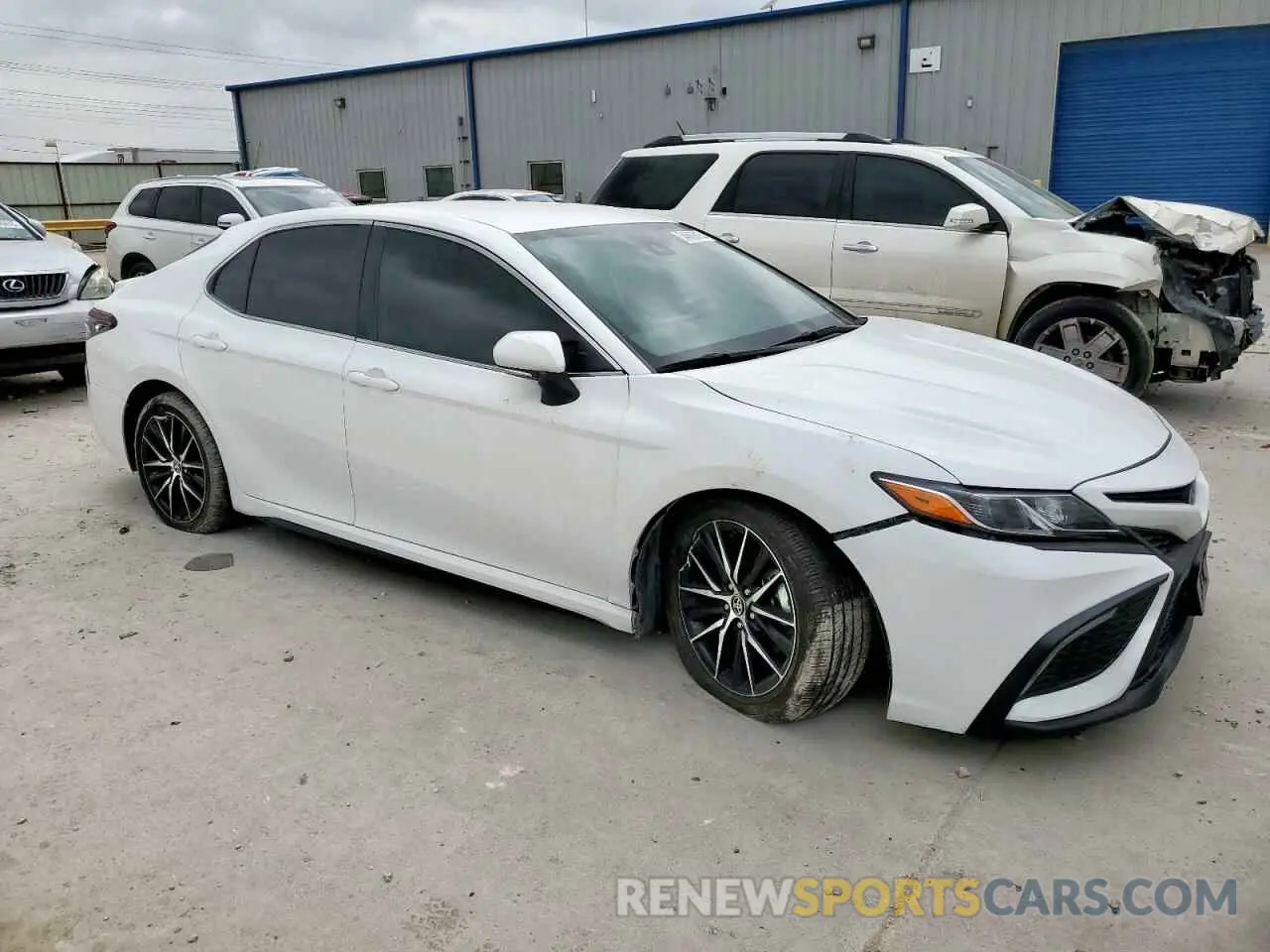 4 Photograph of a damaged car 4T1G11AK5RU892619 TOYOTA CAMRY 2024