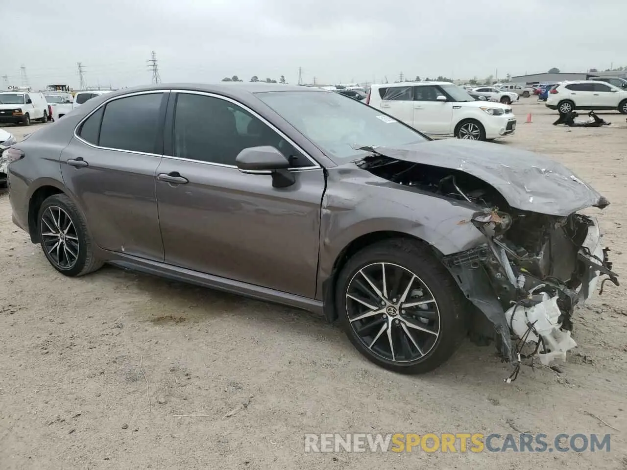 4 Photograph of a damaged car 4T1G11AK6RU218253 TOYOTA CAMRY 2024