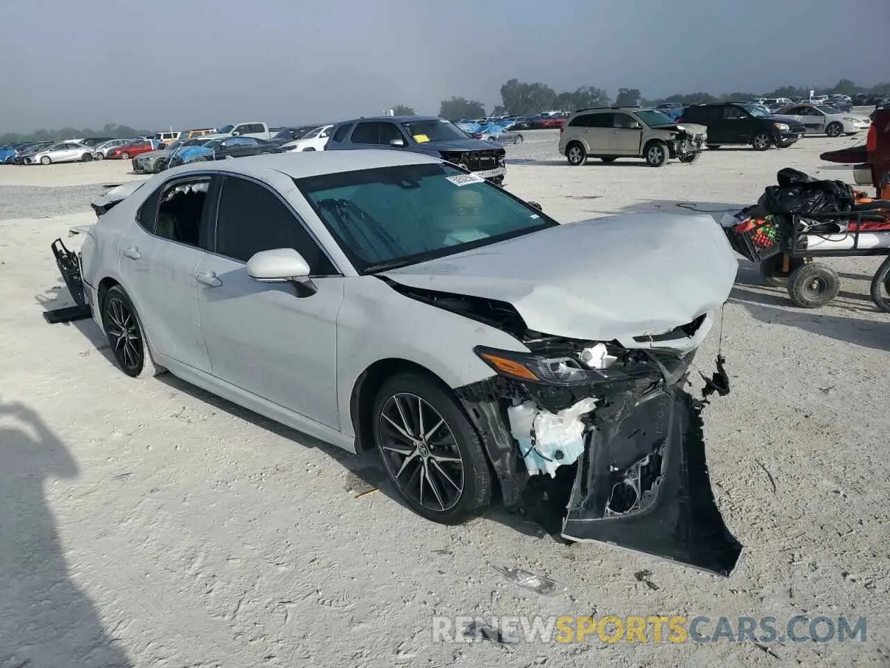 4 Photograph of a damaged car 4T1G11AK7RU204149 TOYOTA CAMRY 2024