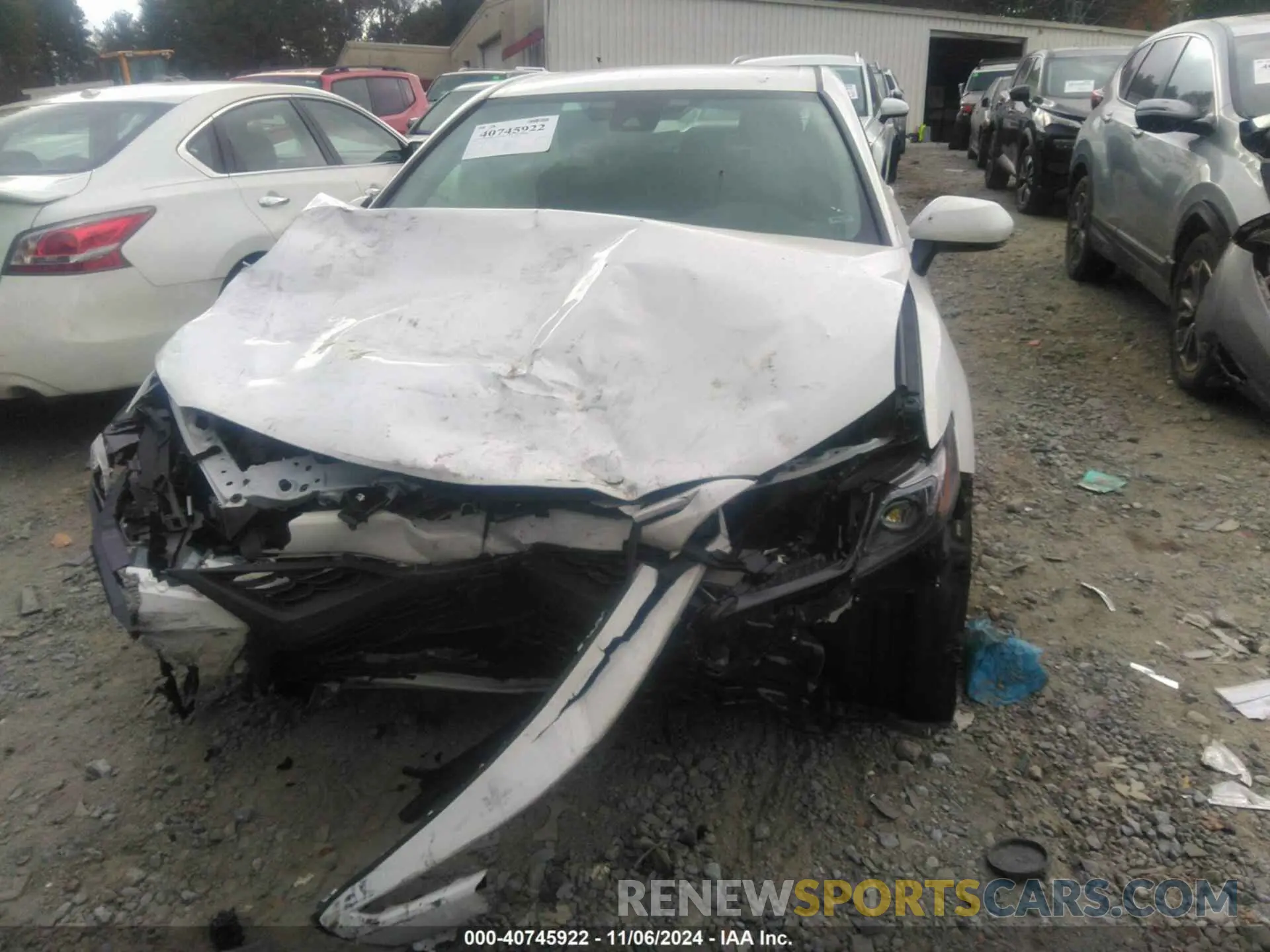 12 Photograph of a damaged car 4T1G11AK7RU909596 TOYOTA CAMRY 2024