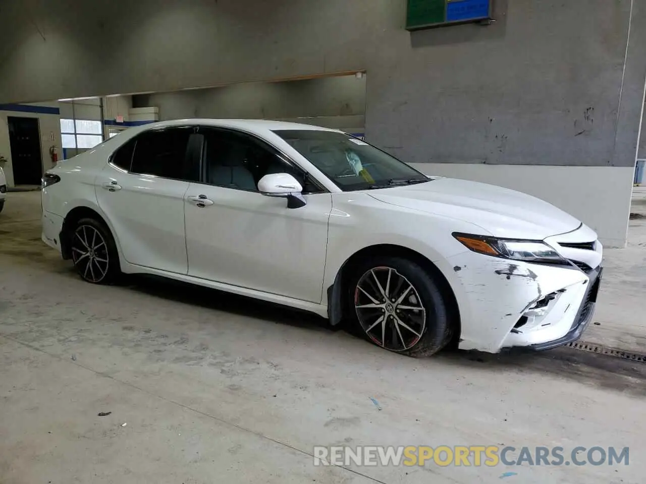 4 Photograph of a damaged car 4T1G11AK9RU193509 TOYOTA CAMRY 2024