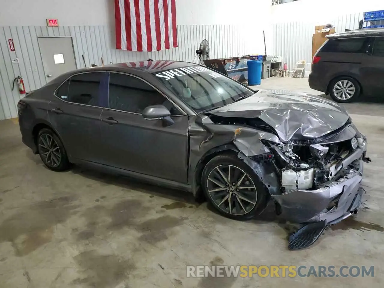 4 Photograph of a damaged car 4T1G11AKXRU842881 TOYOTA CAMRY 2024