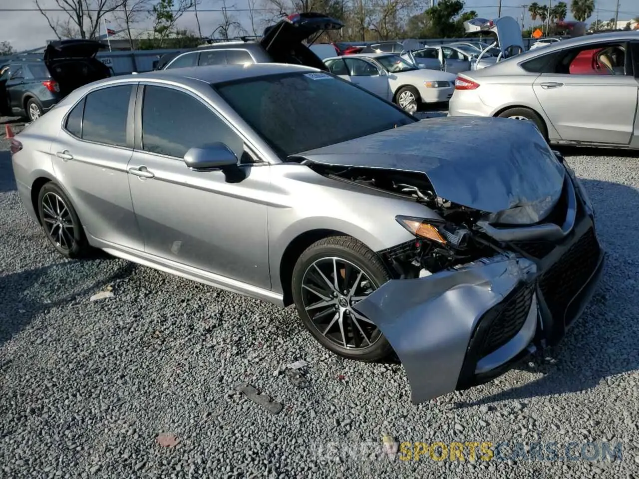 4 Photograph of a damaged car 4T1G11AKXRU871572 TOYOTA CAMRY 2024