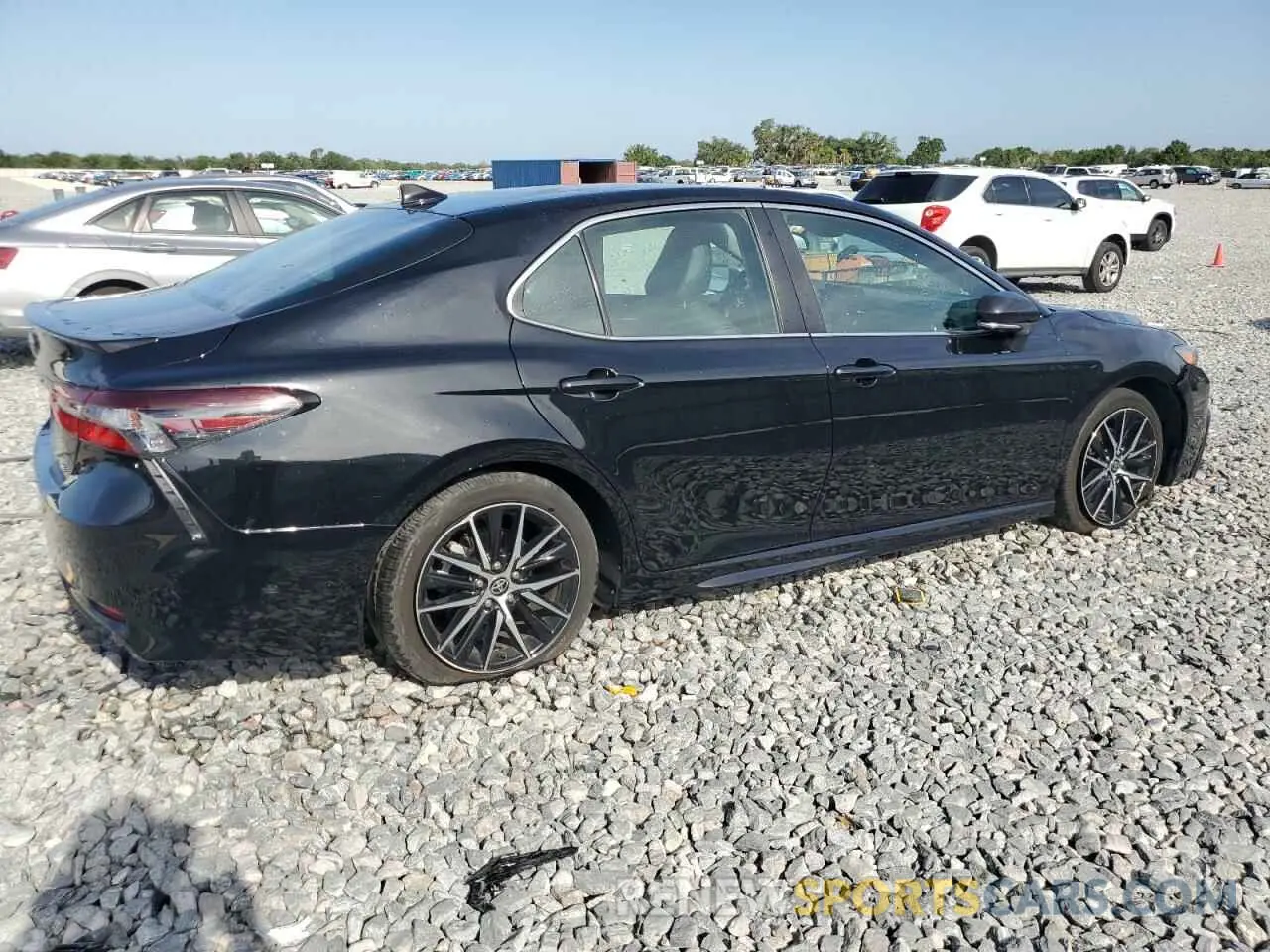 3 Photograph of a damaged car 4T1G11AKXRU885603 TOYOTA CAMRY 2024