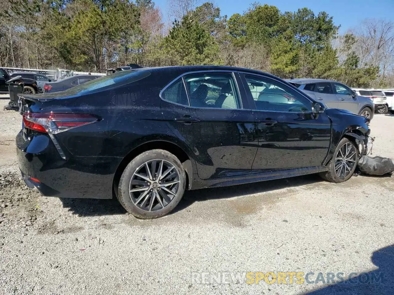3 Photograph of a damaged car 4T1G11AKXRU895371 TOYOTA CAMRY 2024
