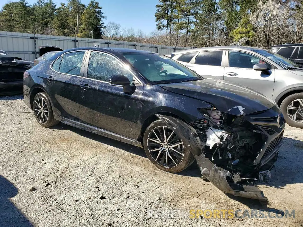 4 Photograph of a damaged car 4T1G11AKXRU895371 TOYOTA CAMRY 2024