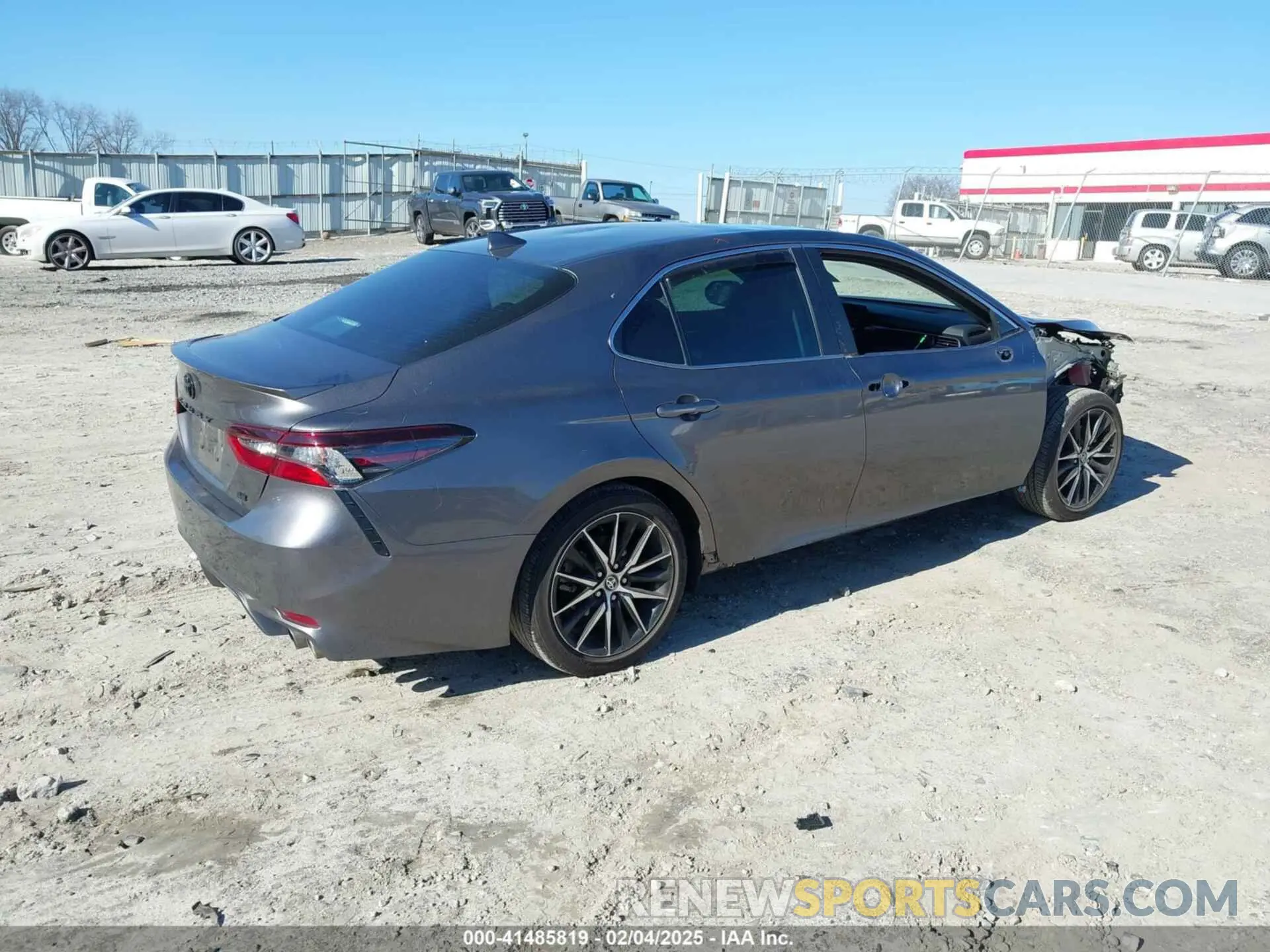 4 Photograph of a damaged car 4T1G11AKXRU915876 TOYOTA CAMRY 2024