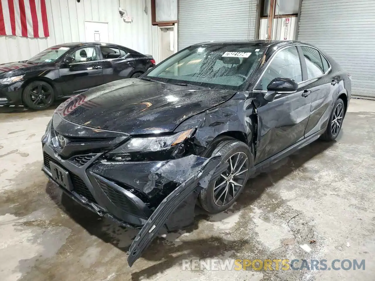 1 Photograph of a damaged car 4T1G11BKXRU119868 TOYOTA CAMRY 2024