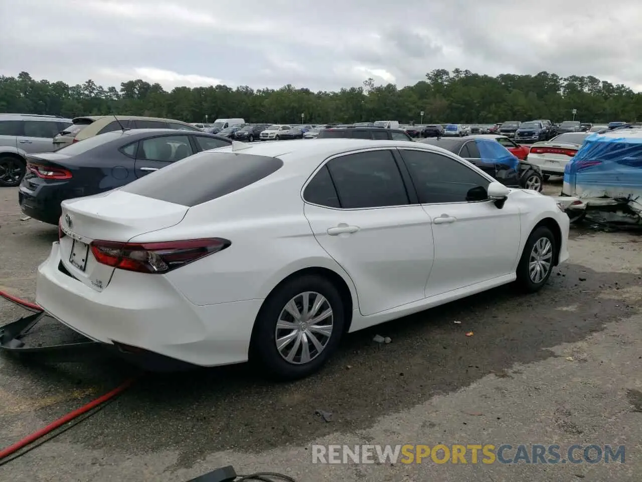 3 Photograph of a damaged car 4T1H31AK6RU632597 TOYOTA CAMRY 2024