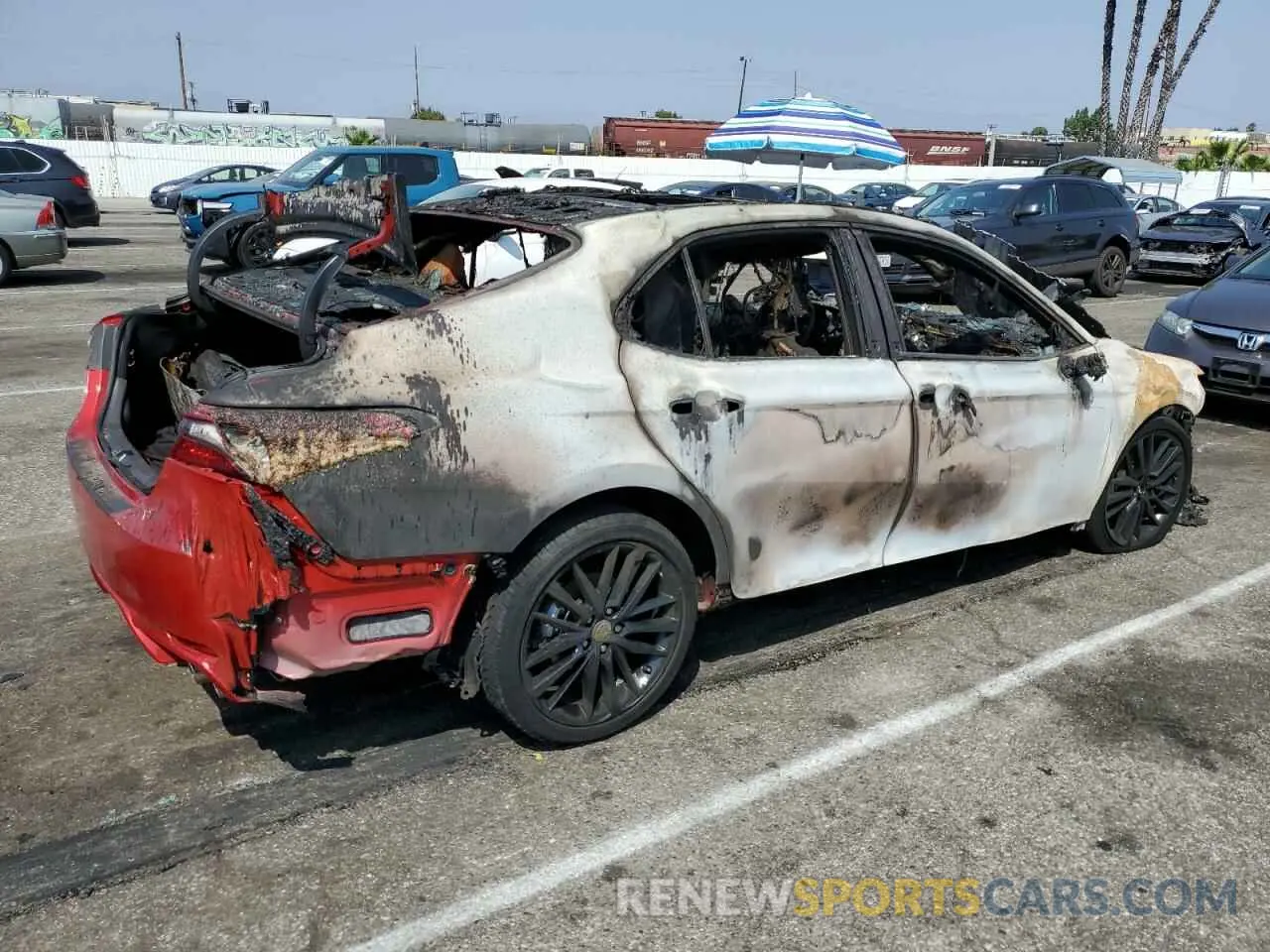 3 Photograph of a damaged car 4T1KZ1AK2RU104091 TOYOTA CAMRY 2024