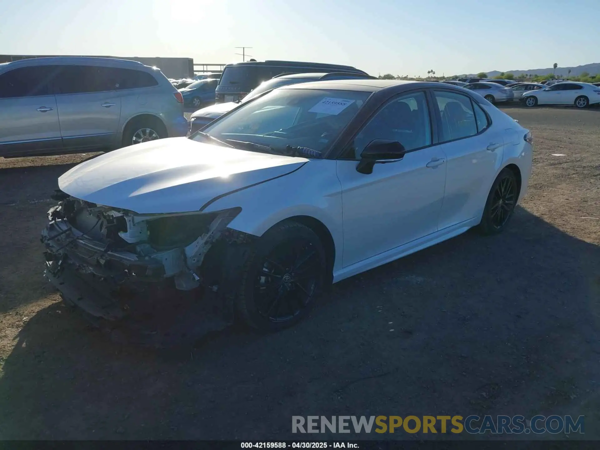 2 Photograph of a damaged car 4T1KZ1AK5RU090039 TOYOTA CAMRY 2024