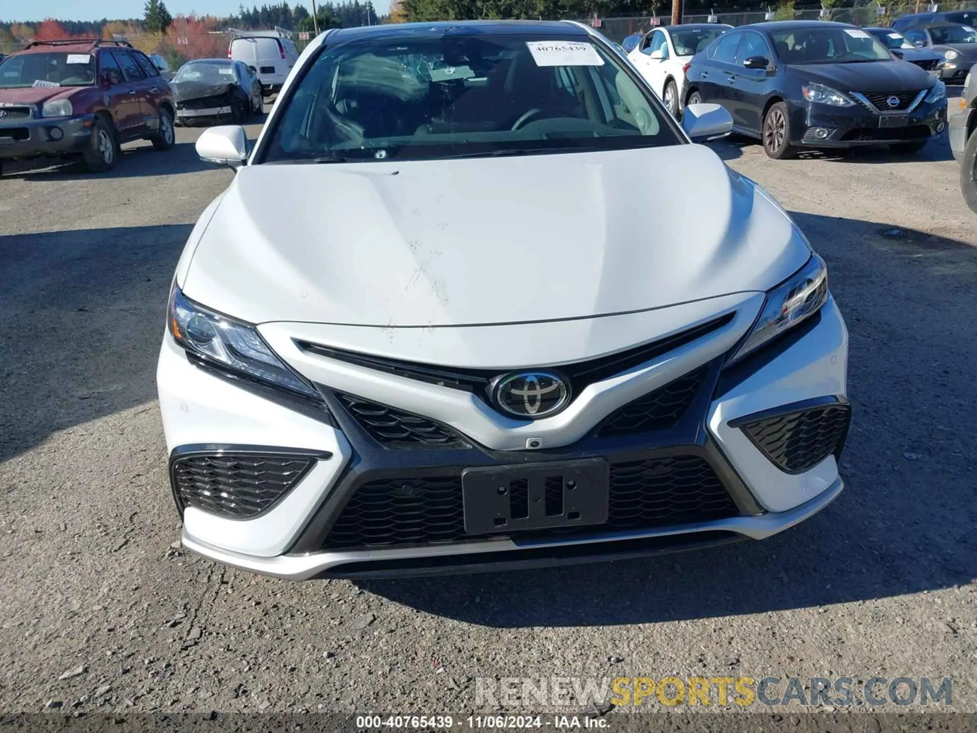 12 Photograph of a damaged car 4T1KZ1AK7RU103194 TOYOTA CAMRY 2024