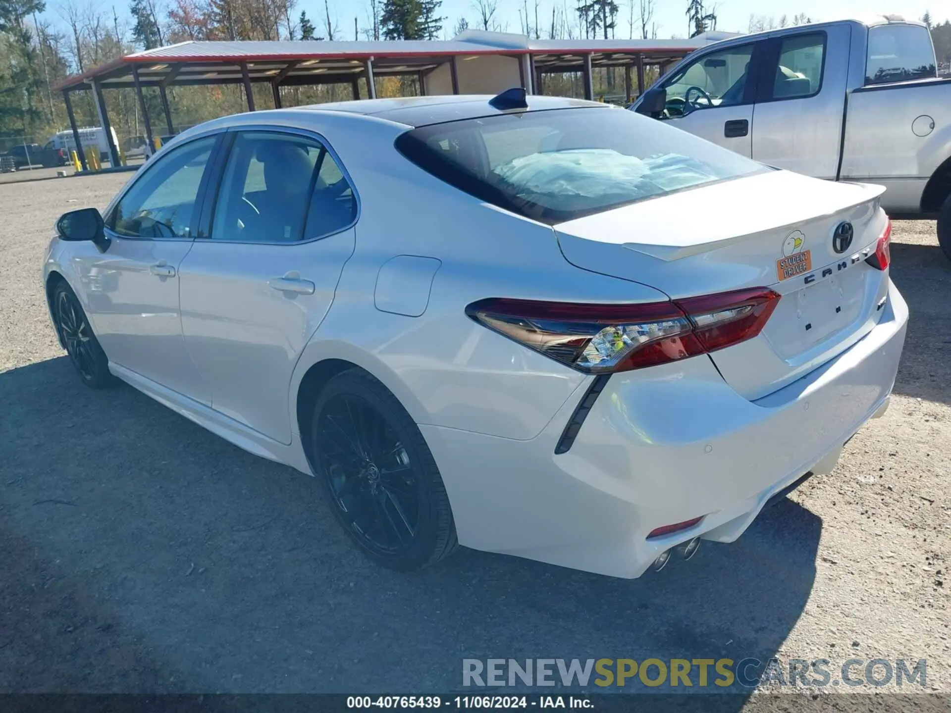 3 Photograph of a damaged car 4T1KZ1AK7RU103194 TOYOTA CAMRY 2024