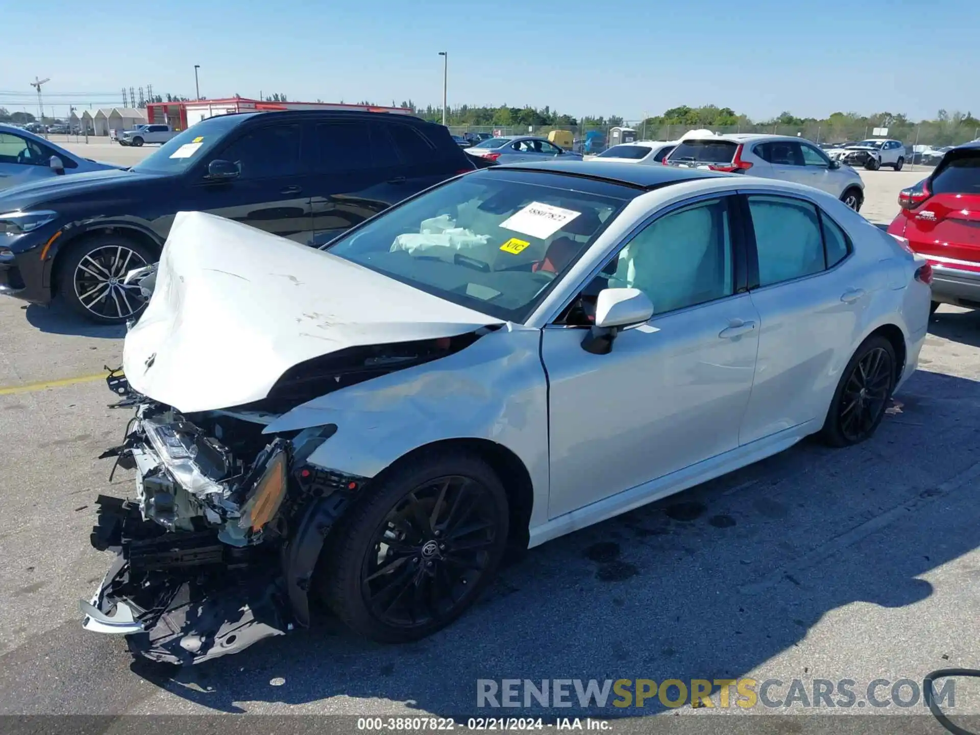 2 Photograph of a damaged car 4T1KZ1AK9RU098354 TOYOTA CAMRY 2024