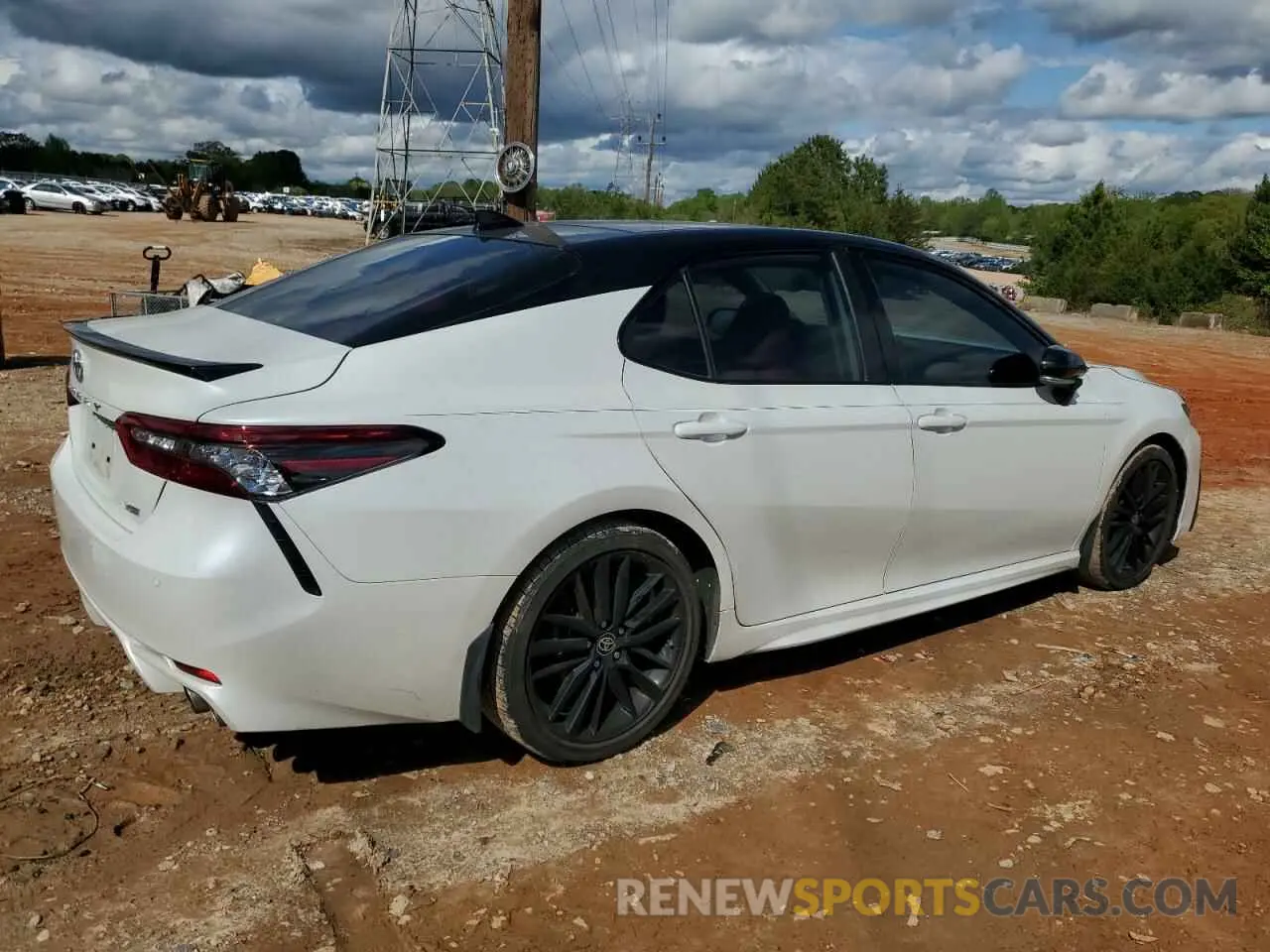 3 Photograph of a damaged car 4T1KZ1AKXRU093146 TOYOTA CAMRY 2024